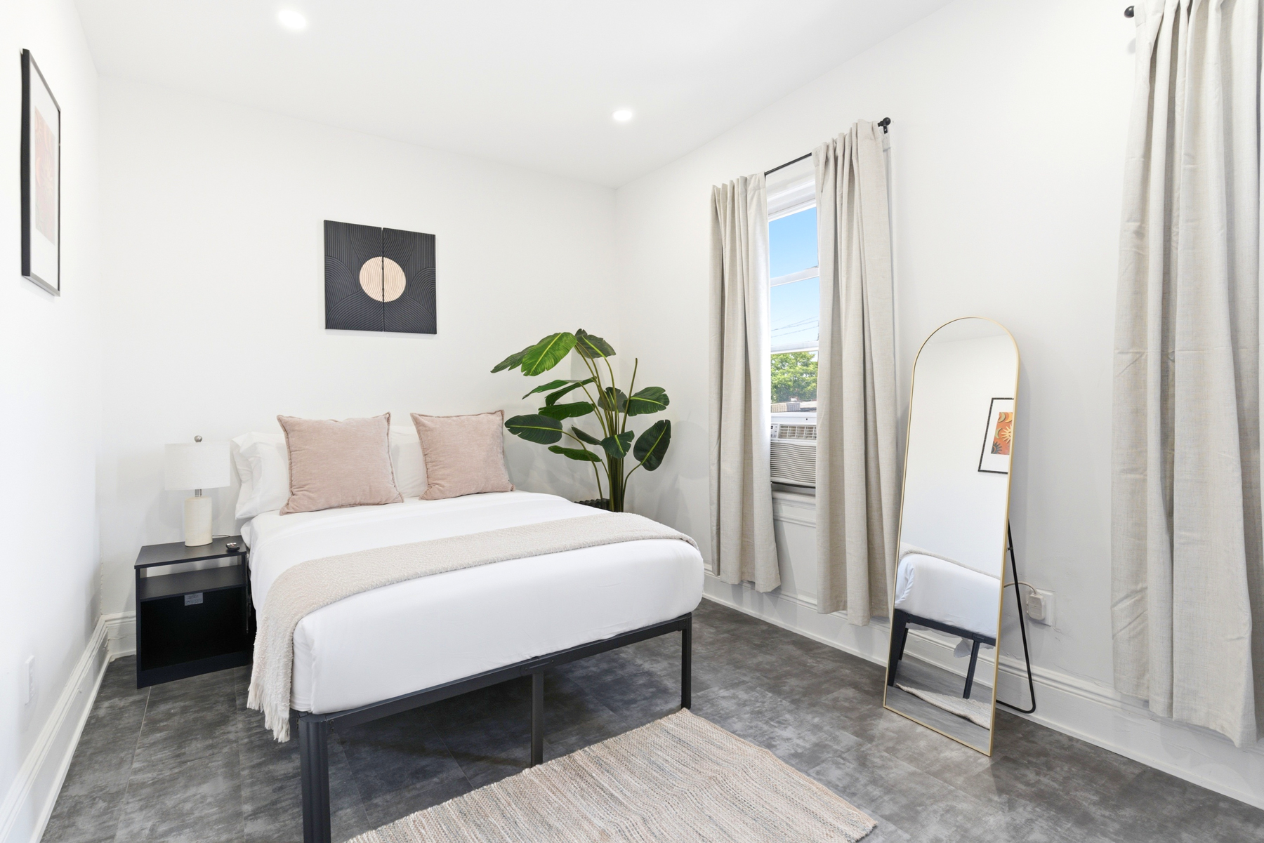 Bright main bedroom at The Broadway House